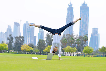 Image showing woman with laptop in park