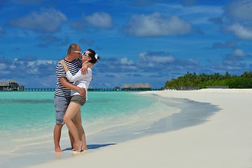 Image showing happy young  couple at summer vacation have fun and relax at bea