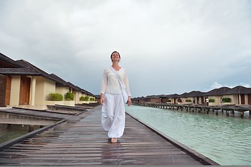 Image showing young woman relax on cloudy summer day