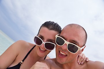 Image showing happy young  couple at summer vacation have fun and relax at bea