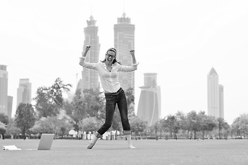 Image showing woman with laptop in park