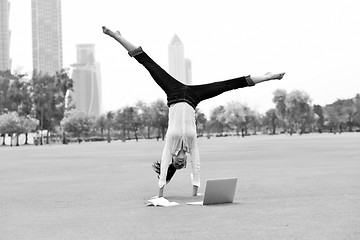 Image showing woman with laptop in park