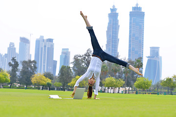 Image showing woman with laptop in park