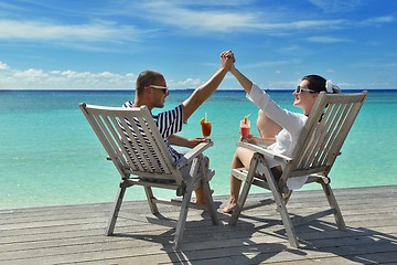 Image showing happy young couple relax and take fresh drink