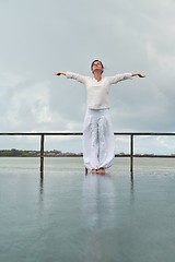 Image showing young woman relax on cloudy summer day