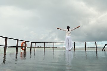 Image showing young woman relax on cloudy summer day