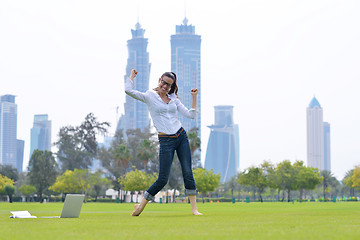 Image showing woman with laptop in park