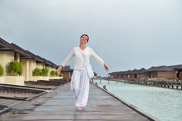 Image showing young woman relax on cloudy summer day