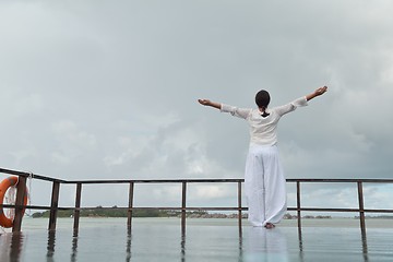 Image showing young woman relax on cloudy summer day