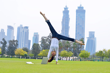 Image showing woman with laptop in park