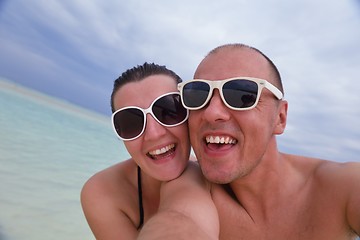 Image showing happy young  couple at summer vacation have fun and relax at bea