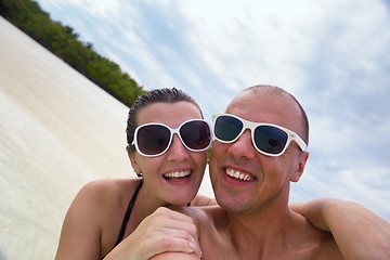 Image showing happy young  couple at summer vacation have fun and relax at bea