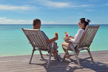 Image showing happy young couple relax and take fresh drink
