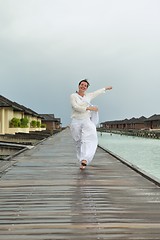 Image showing young woman relax on cloudy summer day