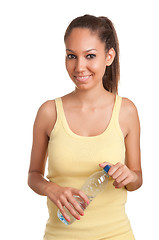 Image showing Woman Holding Bottle of Water