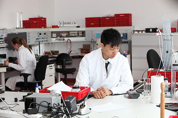 Image showing Young Asian laboratory technician