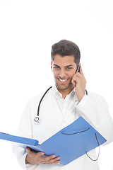 Image showing Doctor speaking on his mobile phone