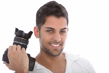 Image showing Handsome man holding a dslr camera