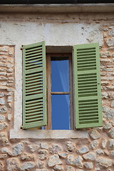 Image showing Window with green wooden shutters