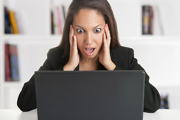 Image showing Woman in Panic Looking At A Computer Monitor