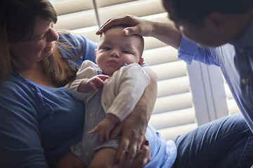 Image showing Mixed Race Couple Enjoying Their Newborn Son