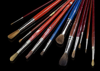 Image showing used paintbrushes