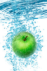 Image showing Green Apple in the Water.