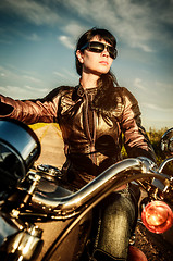 Image showing Biker girl on a motorcycle