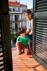 Image showing smiling mother and son