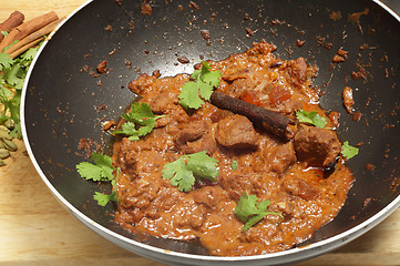 Image showing Balti lamb curry in a wok