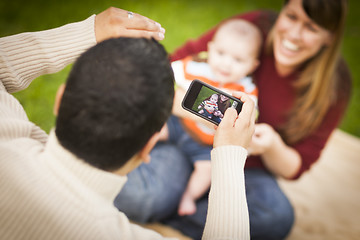 Image showing Happy Mixed Race Parents and Baby Boy Taking Self Portraits