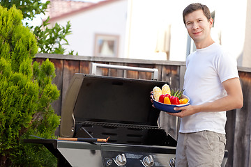 Image showing man preparing food