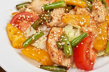 Image showing Warm salad with chicken