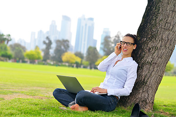 Image showing woman with laptop in park