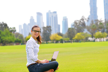 Image showing woman with laptop in park