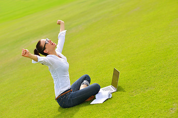 Image showing woman with laptop in park