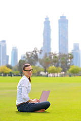 Image showing woman with laptop in park