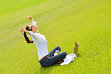 Image showing woman with laptop in park