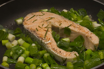 Image showing Salmon steak with spring onion