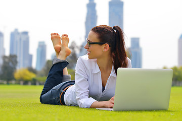 Image showing woman with laptop in park