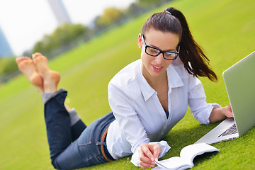 Image showing woman with laptop in park