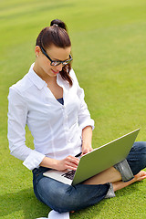 Image showing woman with laptop in park