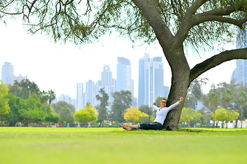 Image showing woman with laptop in park