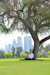 Image showing woman with laptop in park