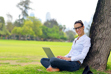 Image showing woman with laptop in park