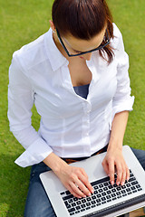 Image showing woman with laptop in park