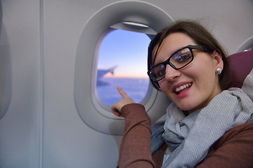 Image showing woman in airplane travel