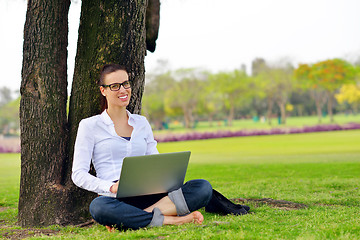 Image showing woman with laptop in park