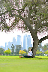 Image showing woman with laptop in park