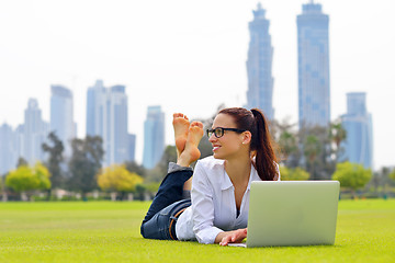 Image showing woman with laptop in park